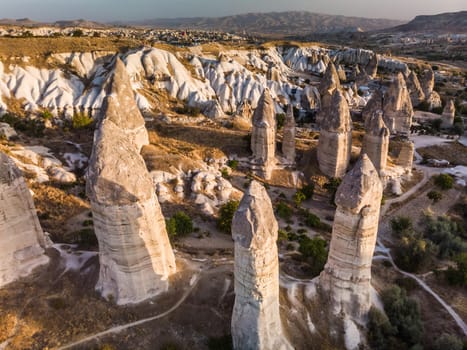 Aerial drone view of the fairy chimney landscape in Love Valley of Cappadocia in Goreme, Turkey.