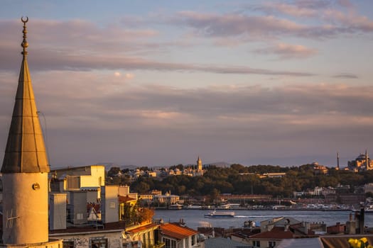Istanbul sunset skyline panoramic view of Istanbul Turkey. Beautiful Bosphorus with mosques at the background.
