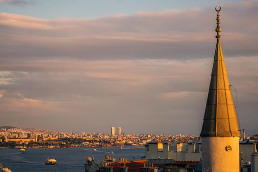 Istanbul sunset skyline panoramic view of Istanbul Turkey. Beautiful Bosphorus with mosques at the background.