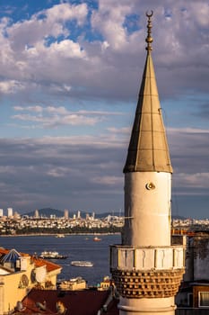 Istanbul sunset skyline panoramic view of Istanbul Turkey. Beautiful Bosphorus with mosques at the background.