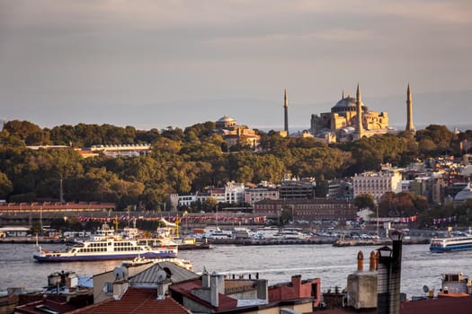 Istanbul sunset skyline panoramic view of Istanbul Turkey. Beautiful Bosphorus with mosques at the background.