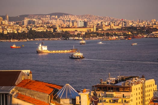 Istanbul sunset skyline panoramic view of Istanbul Turkey. Beautiful Bosphorus with mosques at the background.