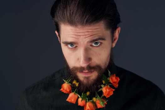 Cute man decorating in the city flowers romance gift. High quality photo