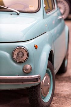 terni,italy January 13 2021:details of a light blue vintage fiat 500