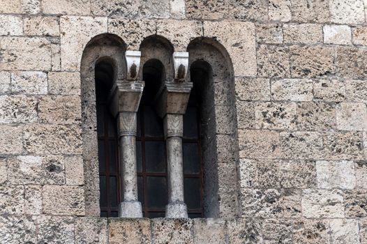 architectural detail of a church window in Terni