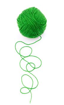 The idea is a tangled thread. Green ball of yarn on white background