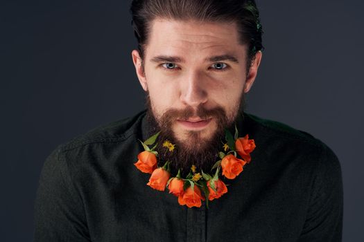 Portrait of a bearded man flowers decoration gift romance. High quality photo