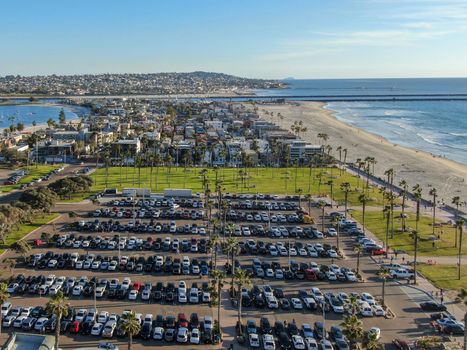 Aerial view of Mission Bay and Beaches in San Diego, California. USA. Community built on a sandbar with villas, sea port and recreational Mission Bay Park. Californian beach lifestyle.