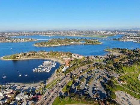 Aerial view of Mission Bay and Beaches in San Diego, California. USA. Community built on a sandbar with villas, sea port and recreational Mission Bay Park. Californian beach lifestyle.