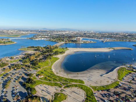 Aerial view of Mission Bay and Beaches in San Diego, California. USA. Community built on a sandbar with villas, sea port and recreational Mission Bay Park. Californian beach lifestyle.