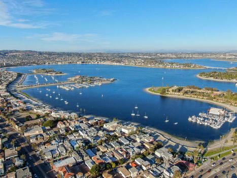 Aerial view of Mission Bay and Beaches in San Diego, California. USA. Community built on a sandbar with villas, sea port and recreational Mission Bay Park. Californian beach lifestyle.