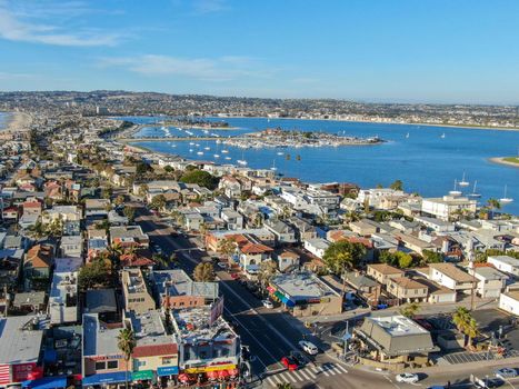 Aerial view of Mission Bay and Beaches in San Diego, California. USA. Community built on a sandbar with villas, sea port and recreational Mission Bay Park. Californian beach lifestyle.