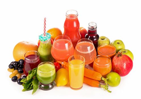 Glasses with fresh organic vegetable and fruit juices isolated on white. Detox diet