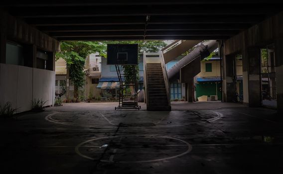 The old cement stairs leading down to the community basketball court under the bridge. No focus, specifically.