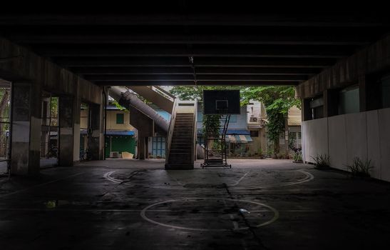 The old cement stairs leading down to the community basketball court under the bridge. No focus, specifically.