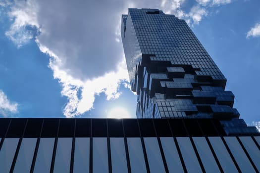 Bangkok, Thailand - July 10, 2019: Looking up at The King Power Mahanakhon skyscraper. The tallest building in Thailand. No focus, specifically.
