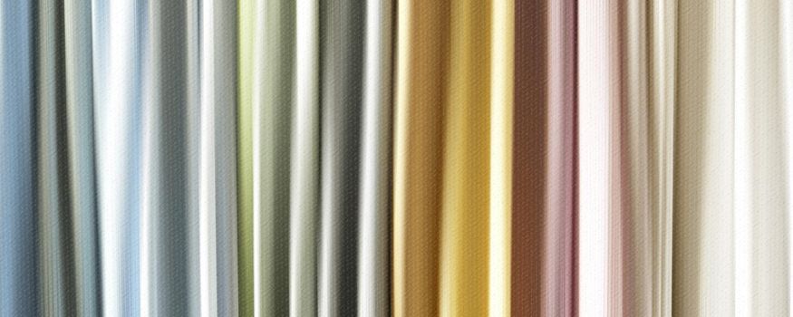 fabric background in pastel colours. Vertical stripes