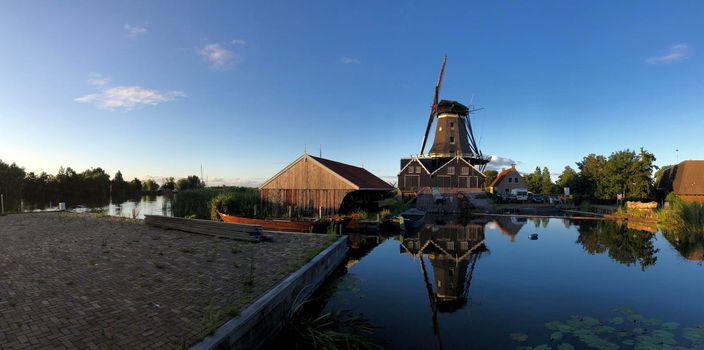 Windmill De Rat in IJlst on a summer evening in Friesland, The Netherlands