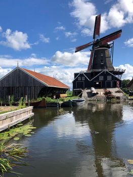 The Windmill De Rat in IJlst on a summer evening in Friesland, The Netherlands