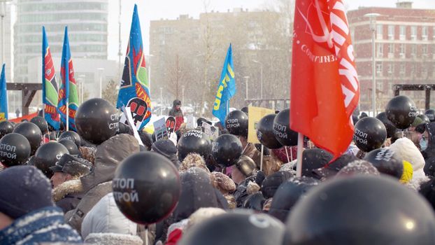 RUSSIA, MOSCOW, march 2020 - Man making a speech at a rally under the snowfall. Protest rally against construction, for maintaining parks. Make Your Voice Heard.