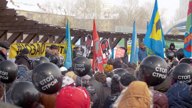 RUSSIA, MOSCOW, march 2020 - Panorama of crowd in Moscow under the snowfall at a protest rally against construction, for maintaining parks. Make Your Voice Heard.