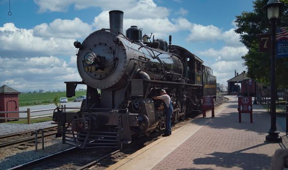 Restored Steam Engine Being Greased and Made Ready for a Day of Work