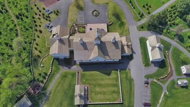 Late Afternoon Fall Aerial View of Beautiful Restored Barns and Countryside