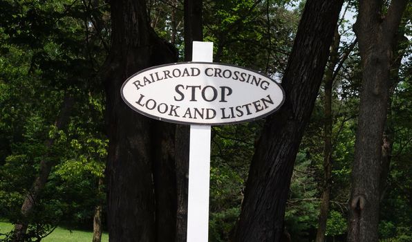 A Rail Road Stop Sign of Stop Look and Listen