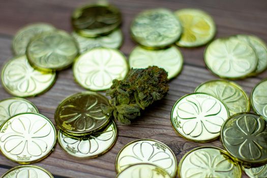 A Colorful Cannabis Nugget Surrounded by a Pile of Saint Pattys Day Gold Coins