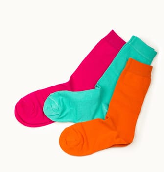 Colorful sock on white background, top view
