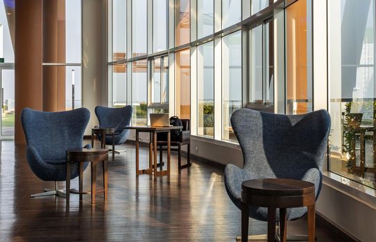 Bangkok, Thailand - Jan 14, 2021 : The new normal for common area in condominium. The seats were set separately according to social distancing policy for the spread of covid-19 prevention. No focus, specifically.