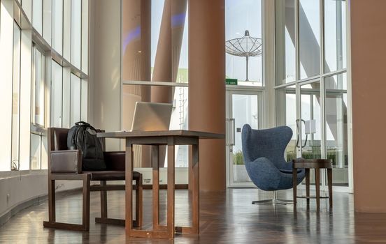 Bangkok, Thailand - Jan 14, 2021 : The new normal for common area in condominium. The seats were set separately according to social distancing policy for the spread of covid-19 prevention. No focus, specifically.