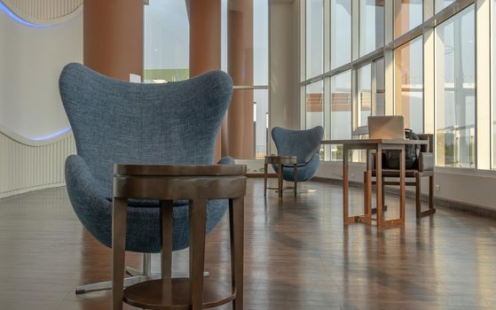 Bangkok, Thailand - Jan 14, 2021 : The new normal for common area in condominium. The seats were set separately according to social distancing policy for the spread of covid-19 prevention. No focus, specifically.