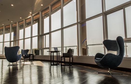 Bangkok, Thailand - Jan 14, 2021 : The new normal for common area in condominium. The seats were set separately according to social distancing policy for the spread of covid-19 prevention. No focus, specifically.