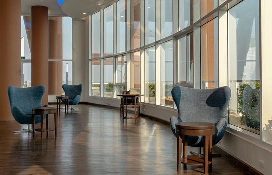 Bangkok, Thailand - Jan 14, 2021 : The new normal for common area in condominium. The seats were set separately according to social distancing policy for the spread of covid-19 prevention. No focus, specifically.