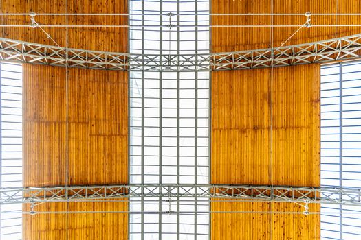 Wooden and glass ceiling of huge hall building