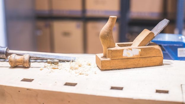 Close up of plane for smoothing timber, workshop