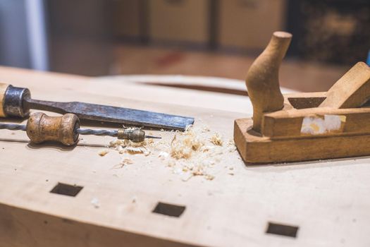 Close up of plane for smoothing timber, workshop