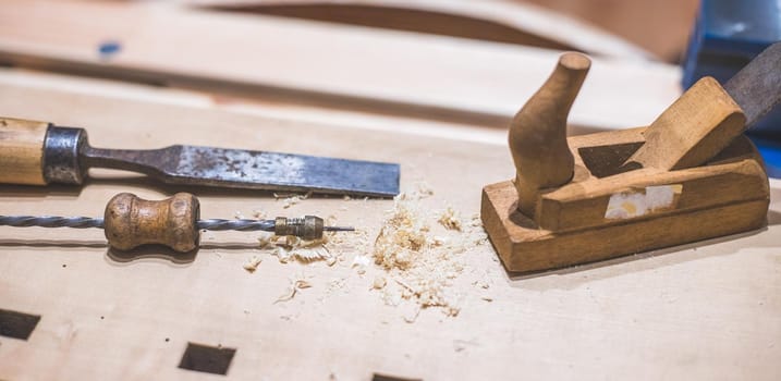 Close up of plane for smoothing timber, workshop