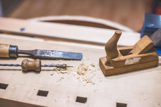 Close up of plane for smoothing timber, workshop