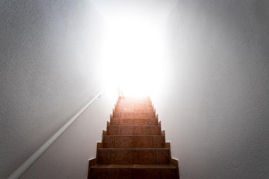 Basement stairs with balustrade. Natural bright sunlight.
