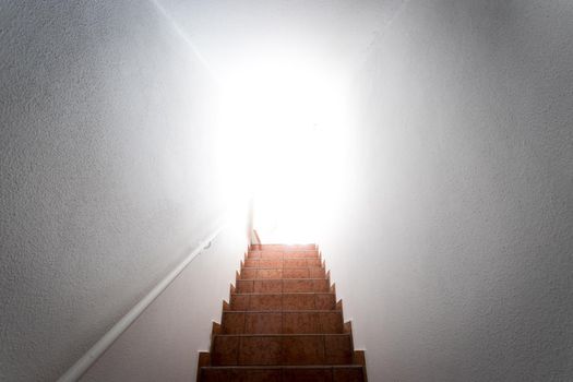 Basement stairs with balustrade. Natural bright sunlight.