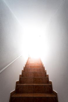 Basement stairs with balustrade. Natural bright sunlight.