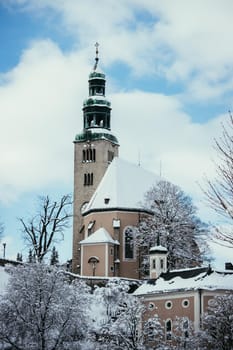 Snowy church in Salzburg, Müllnerkirche