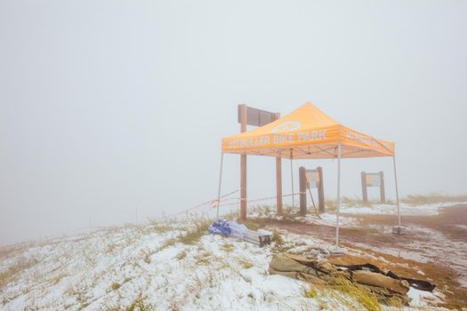 Mt Buller, Australia - January 16 2021: Practice round for the Victorian Downhill Mountain Bike Series after a summer snow storm