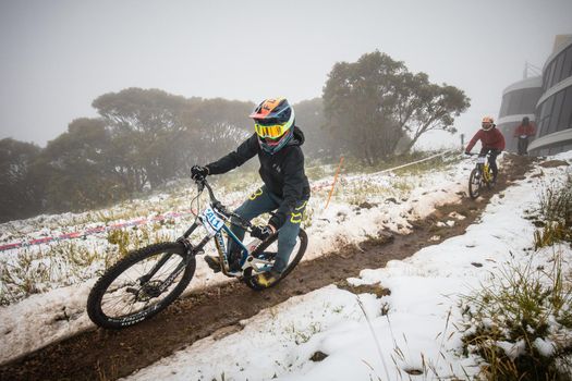 Mt Buller, Australia - January 16 2021: Practice round for the Victorian Downhill Mountain Bike Series after a summer snow storm