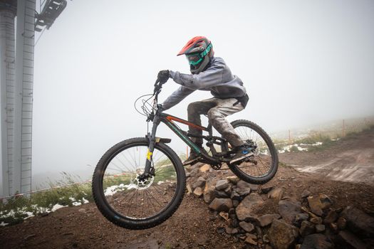 Mt Buller, Australia - January 16 2021: Practice round for the Victorian Downhill Mountain Bike Series after a summer snow storm