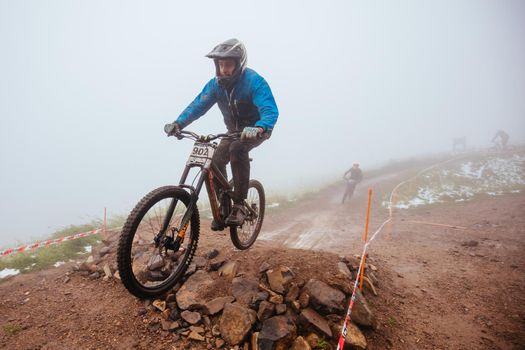 Mt Buller, Australia - January 16 2021: Practice round for the Victorian Downhill Mountain Bike Series after a summer snow storm