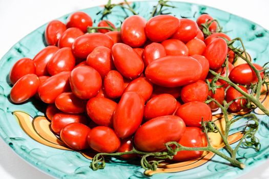 Italian food for Mediterranean healthy diet; Italian original freshly picked cherry tomatoes