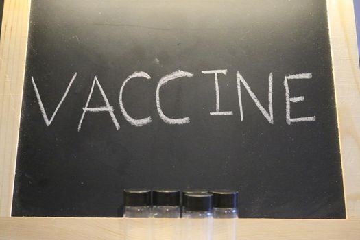 chalkboard with the word vaccine on it. good for any vaccine themed images. High quality photo